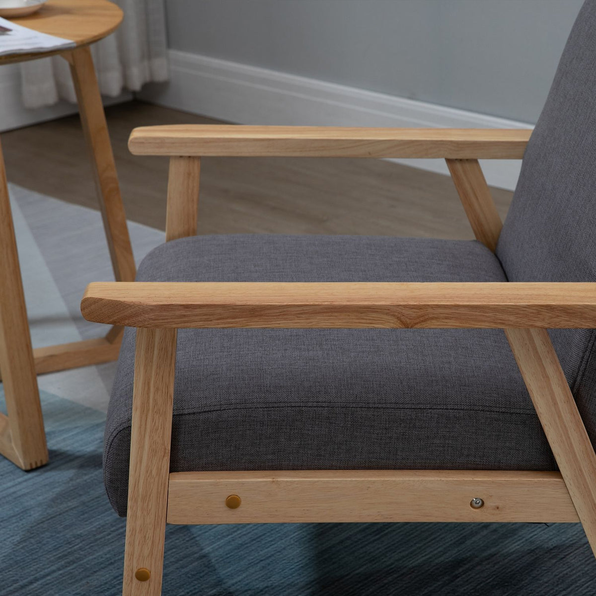 Poltrona bergère imbottita grigia – legno massello, finitura lino