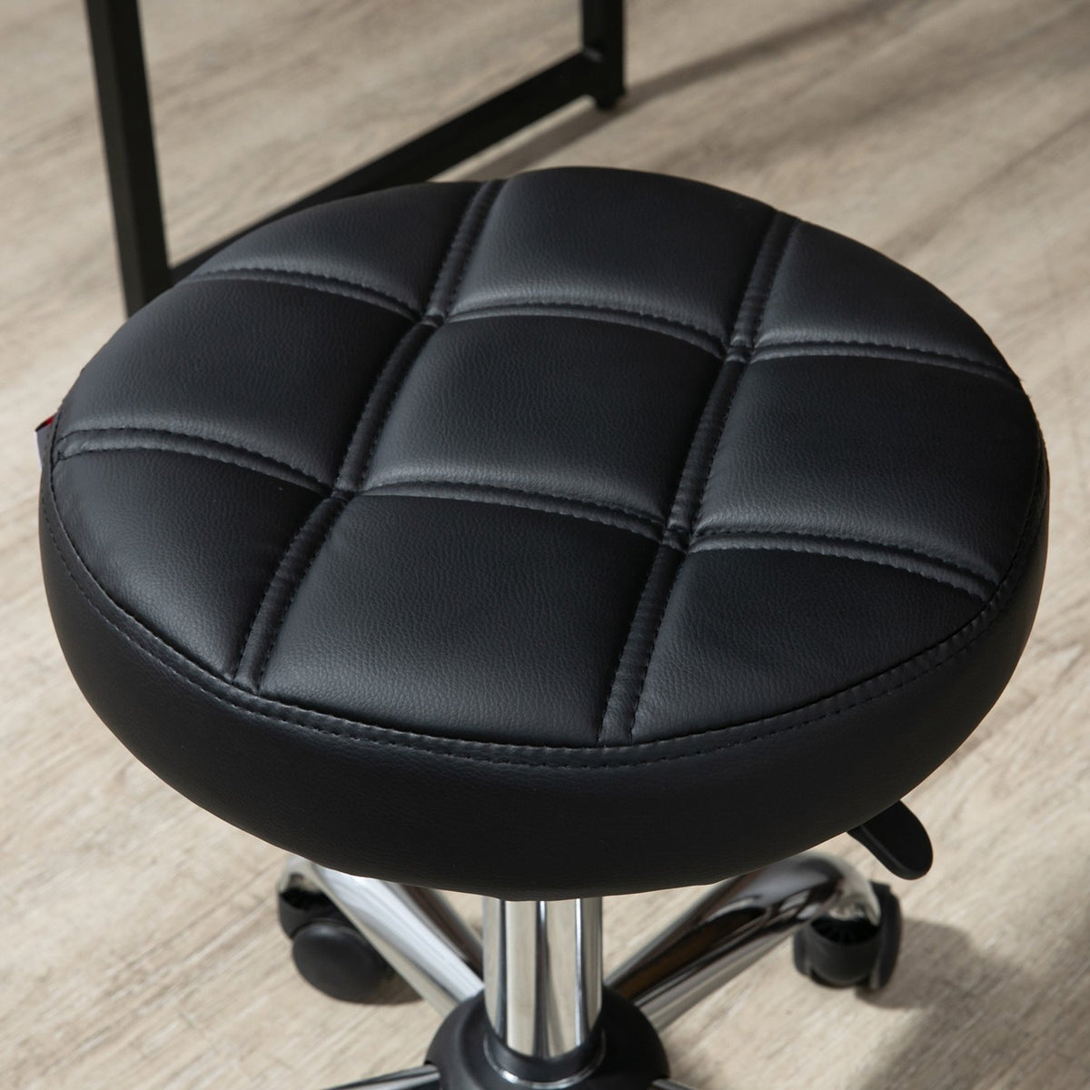Tabouret de salon réglable en hauteur en similicuir noir