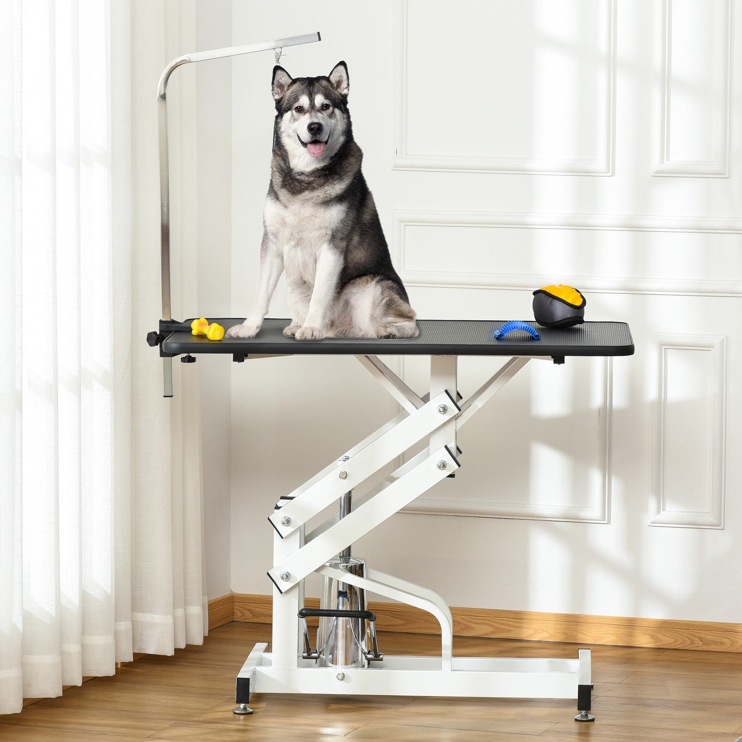 Hydrauliskt hundvårdsbord med klipparm