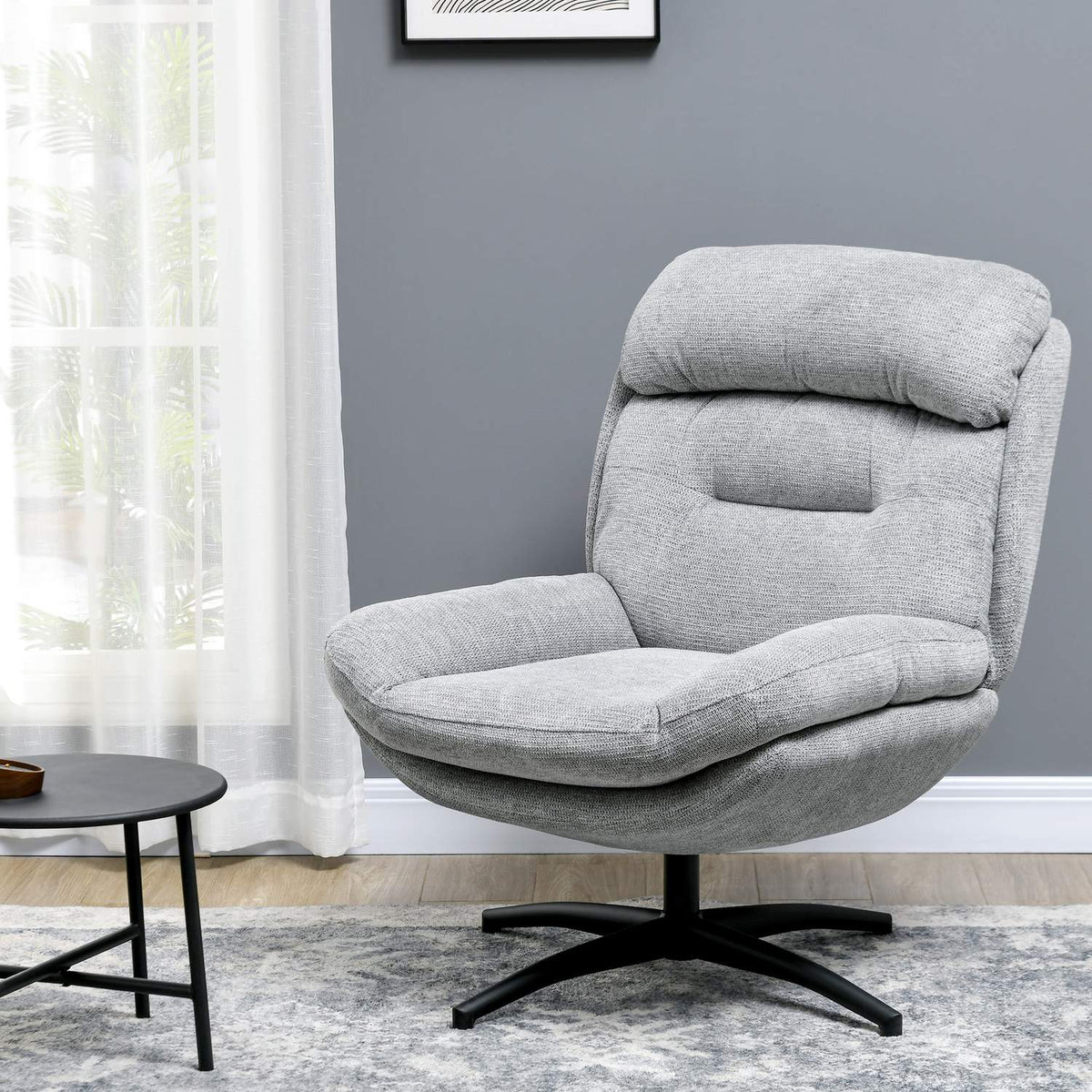 Fauteuil lounge en chenille déperlante, accoudoirs matelassés