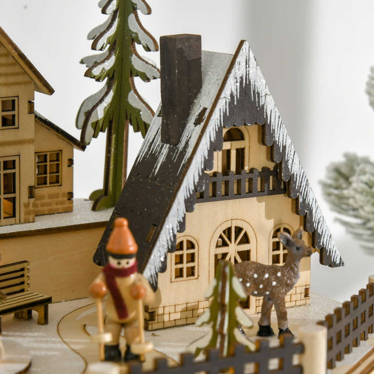 Trätåg-adventskalender med 24 LED-presentförpackningar