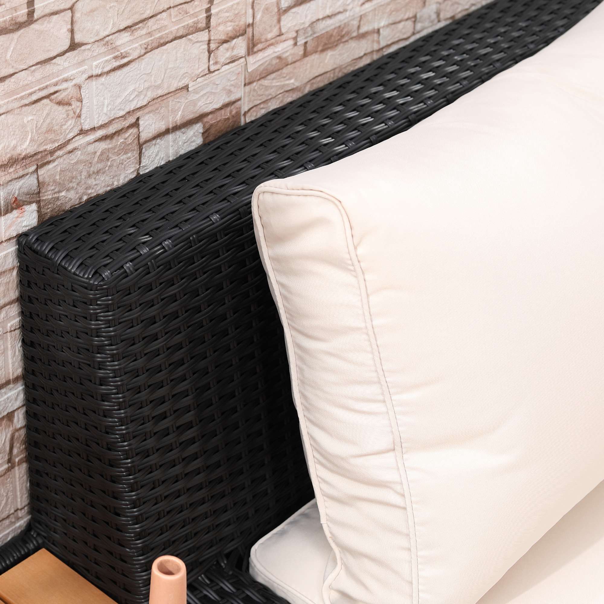 4-delad svart polyrattan utomhusloungegrupp med kuddar