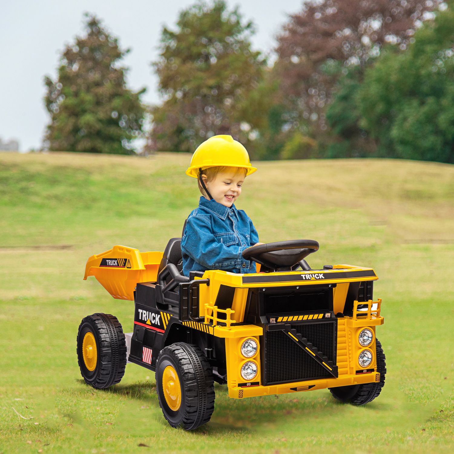 Elektrisk åktraktor för barn med spade, gul