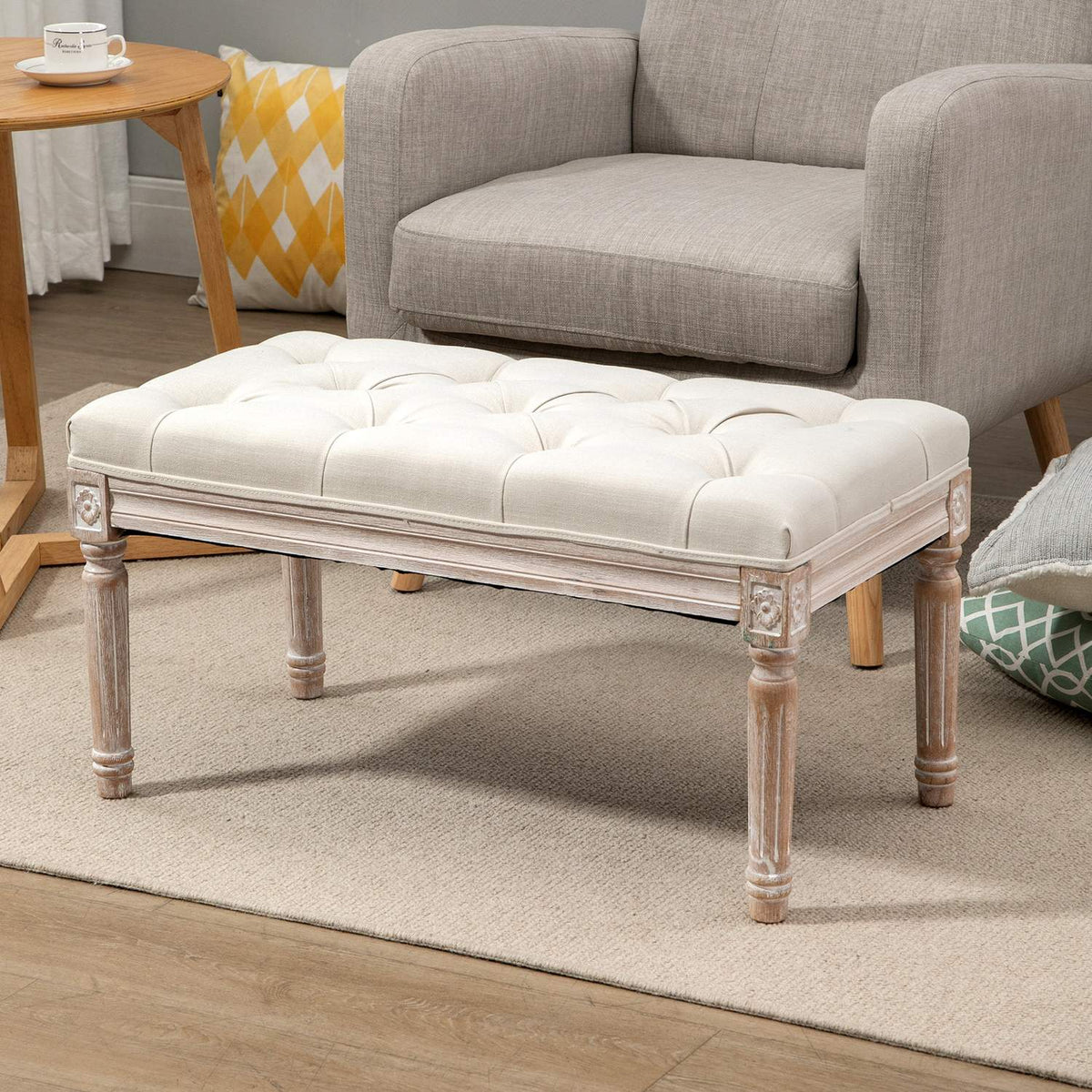 Pouf aspect lin avec assise matelassée et pieds en bois