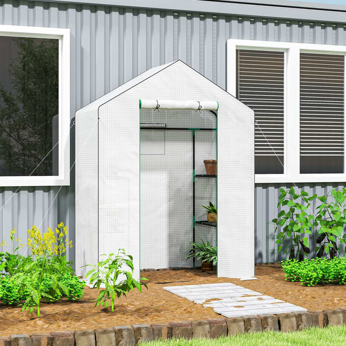 Serre à porte enroulable et étagères pour le jardin